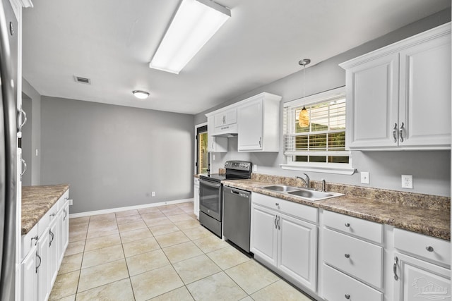 333 Western Pine Rd, Cantonment, FL 32533 - kitchen featuring under cabinet range hood, white cabinets, appliances with stainless steel finishes, and a sink