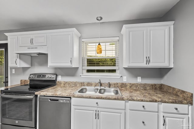 333 Western Pine Rd, Cantonment, FL 32533 - kitchen featuring white cabinets, under cabinet range hood, a sink, pendant lighting, and appliances with stainless steel finishes