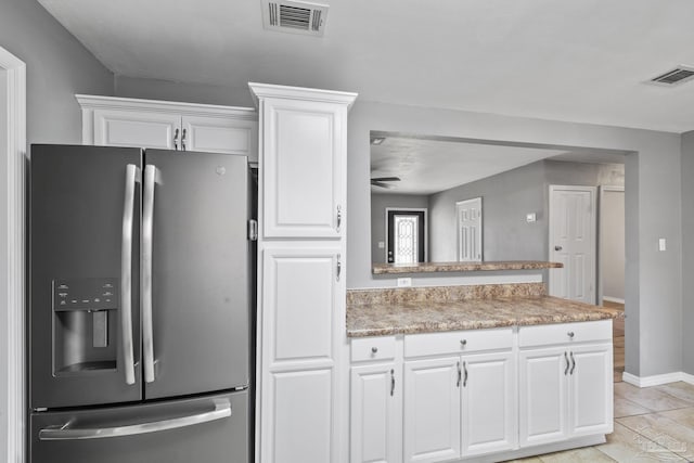 333 Western Pine Rd, Cantonment, FL 32533 - kitchen featuring a peninsula, visible vents, white cabinetry, and stainless steel fridge with ice dispenser