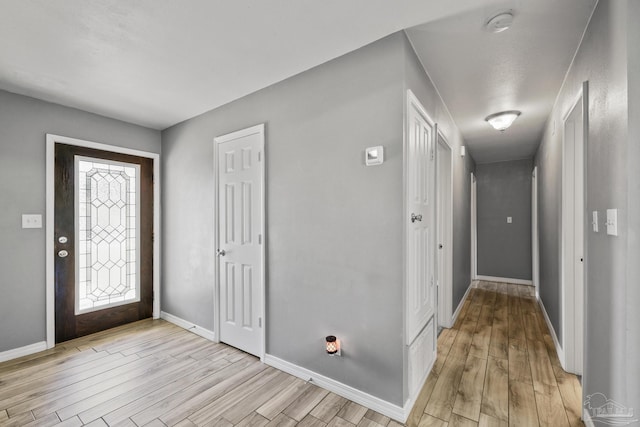 333 Western Pine Rd, Cantonment, FL 32533 - foyer entrance with light wood-type flooring and baseboards