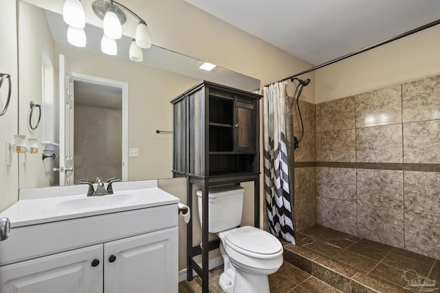 333 Western Pine Rd, Cantonment, FL 32533 - bathroom with vanity, toilet, and tiled shower
