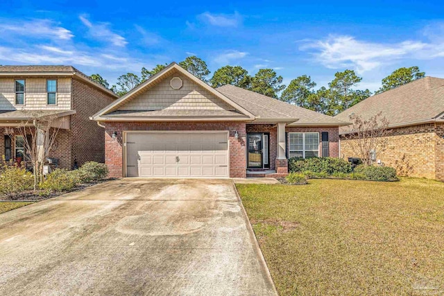 view of front of house featuring a garage and a front yard