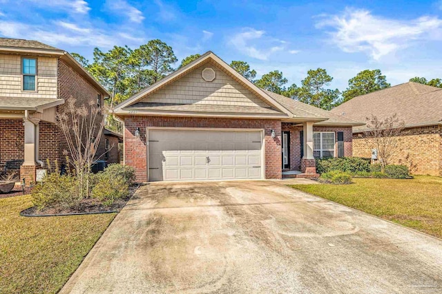 craftsman-style house with a garage and a front yard