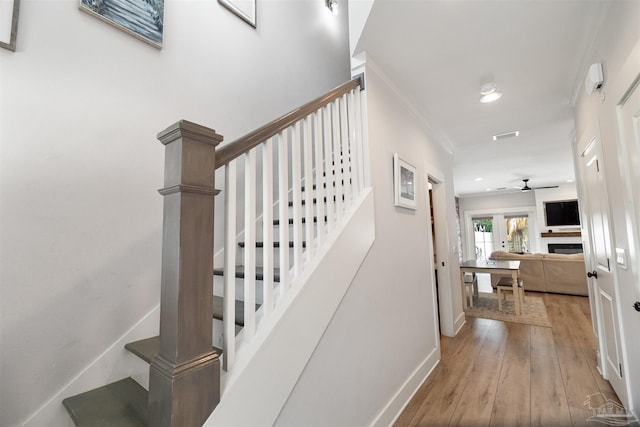 2550 N 11th Ave, Pensacola, FL 32503 - stairway with hardwood / wood-style flooring, a ceiling fan, ornamental molding, baseboards, and recessed lighting