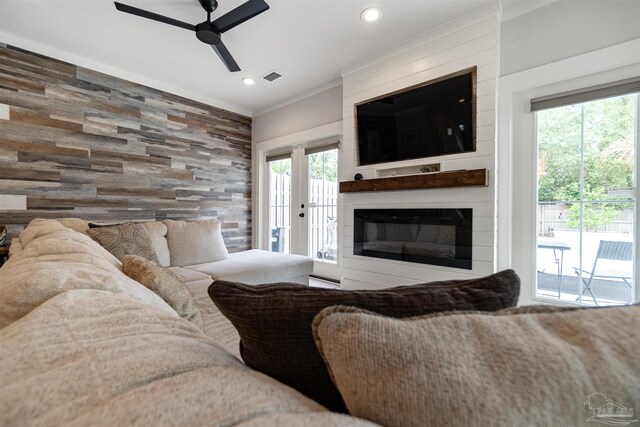 2550 N 11th Ave, Pensacola, FL 32503 - living room with a ceiling fan, a fireplace, ornamental molding, and recessed lighting