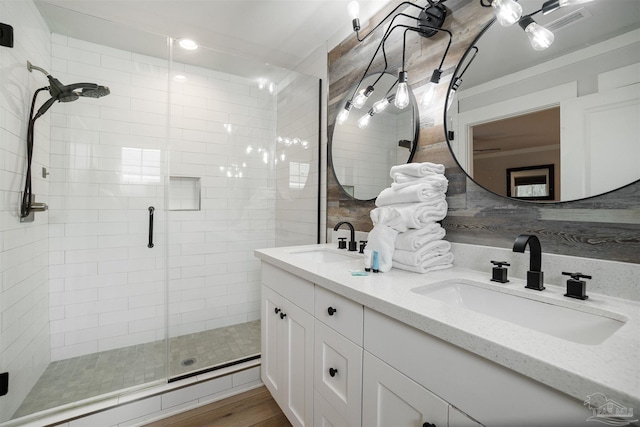 2550 N 11th Ave, Pensacola, FL 32503 - full bathroom with a stall shower, double vanity, and tasteful backsplash