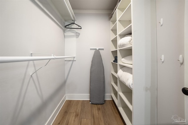 2550 N 11th Ave, Pensacola, FL 32503 - spacious closet featuring wood finished floors