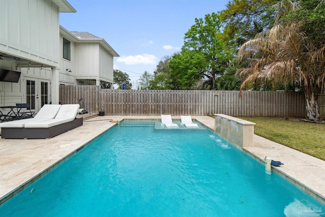 2550 N 11th Ave, Pensacola, FL 32503 - view of pool featuring french doors, a fenced backyard, and a patio area