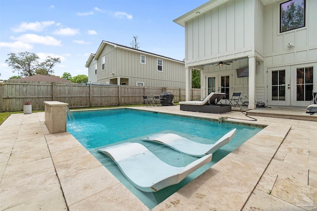2550 N 11th Ave, Pensacola, FL 32503 - view of swimming pool with french doors, a fenced backyard, ceiling fan, and a patio area