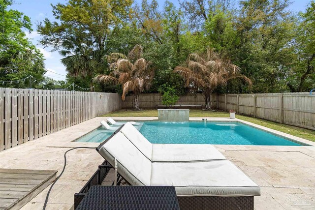 2550 N 11th Ave, Pensacola, FL 32503 - view of swimming pool with a fenced backyard, a patio area, and a pool with connected hot tub