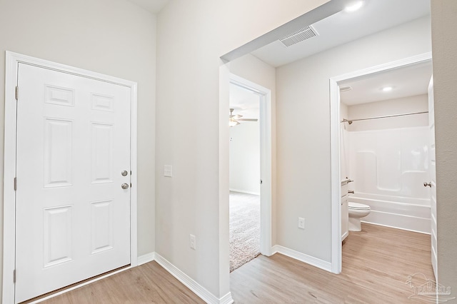 7929 Huntington Creek Ln, Pensacola, FL 32526 - foyer entrance featuring light wood-style flooring and baseboards