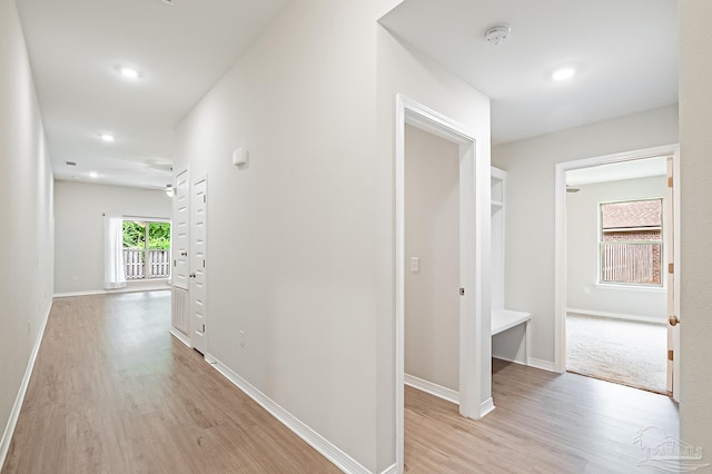 7929 Huntington Creek Ln, Pensacola, FL 32526 - corridor with light wood finished floors, baseboards, and recessed lighting