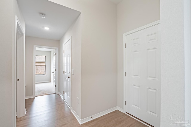 7929 Huntington Creek Ln, Pensacola, FL 32526 - hallway featuring light wood-style flooring and baseboards