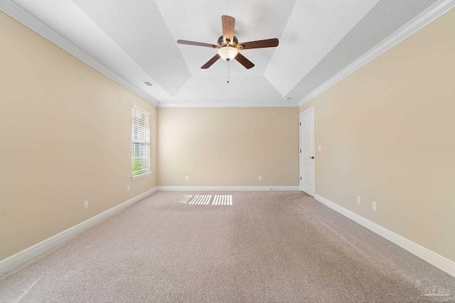 carpeted empty room with crown molding, ceiling fan, and a textured ceiling