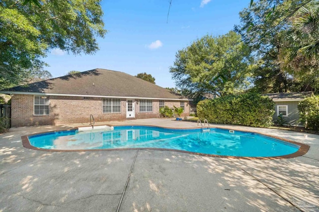 view of pool featuring a patio area