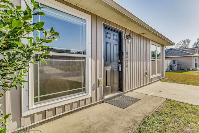 doorway to property featuring a patio