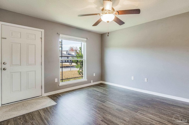 foyer featuring ceiling fan and dark hardwood / wood-style flooring