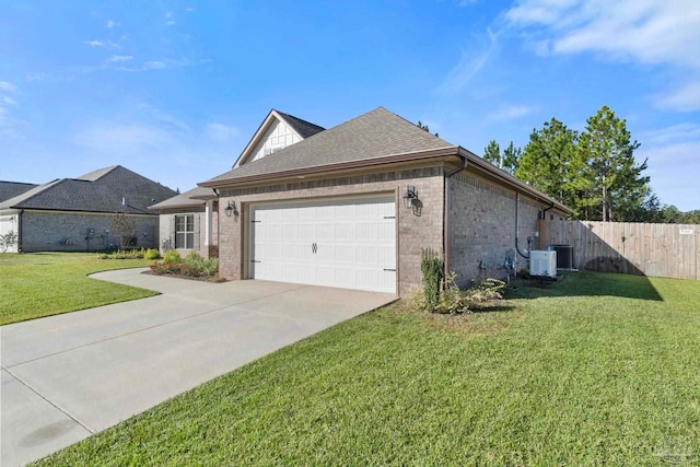 view of side of home featuring a yard, central AC, and a garage