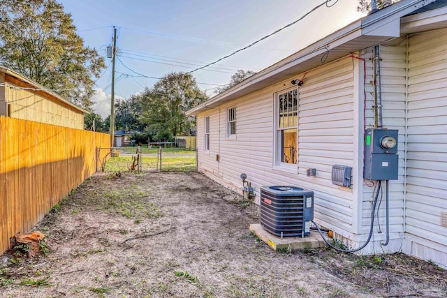 view of yard with central AC unit