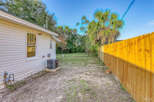 view of yard with central AC