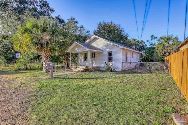 view of front of house with a front lawn