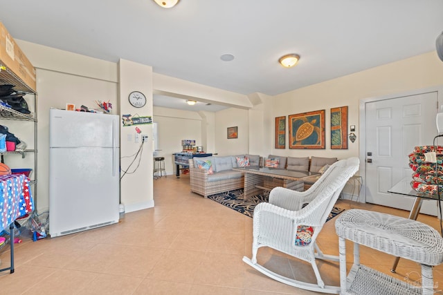 living room featuring light tile patterned floors