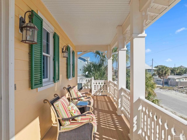 balcony featuring a porch