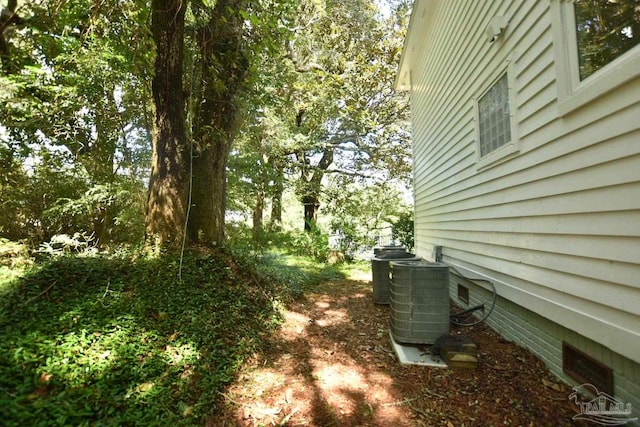 view of yard with central AC