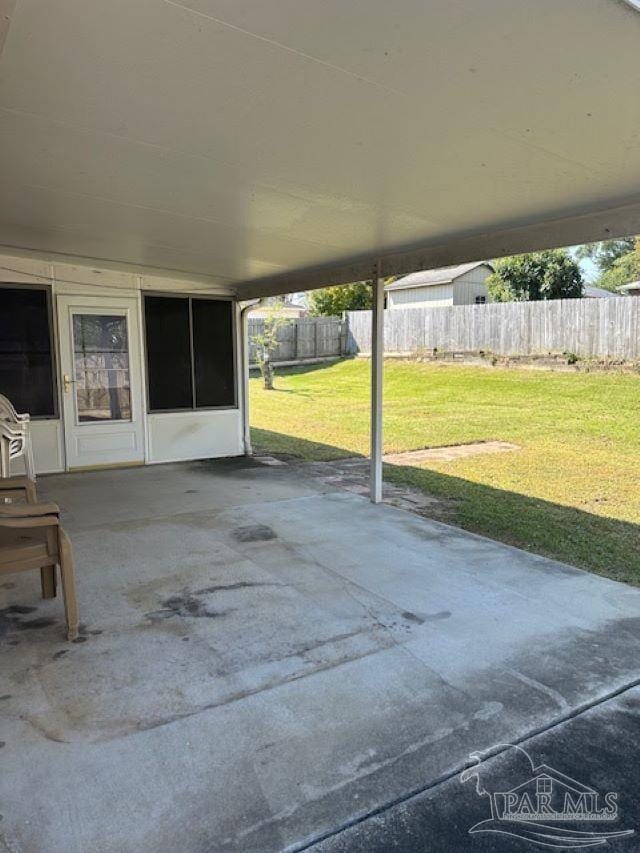 view of patio / terrace featuring fence