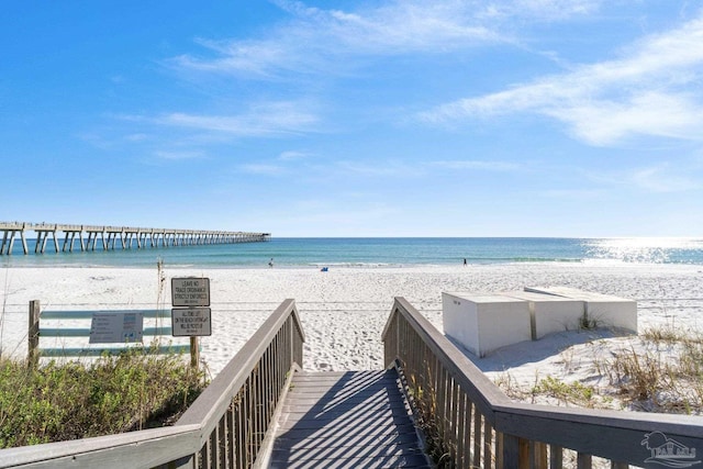 view of water feature with a beach view