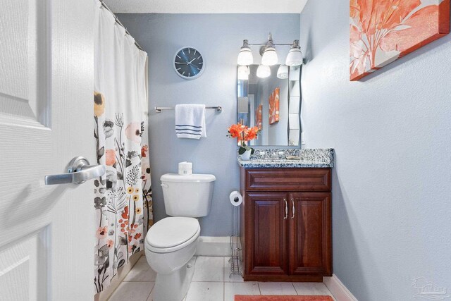 clothes washing area with tile patterned floors and washing machine and dryer