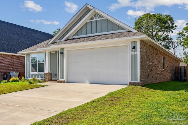 craftsman-style home featuring a garage and a front yard