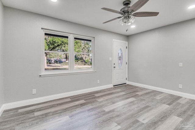 entrance foyer featuring light hardwood / wood-style floors and ceiling fan