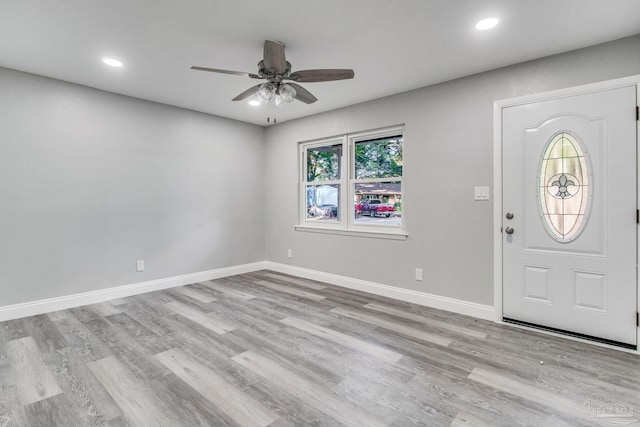 entrance foyer with light hardwood / wood-style floors and ceiling fan