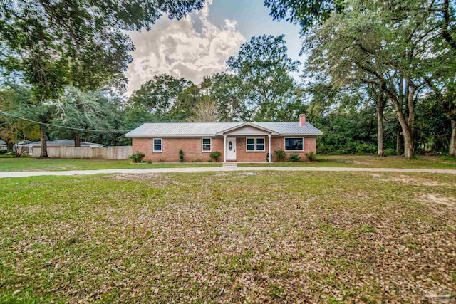 ranch-style house with a front lawn