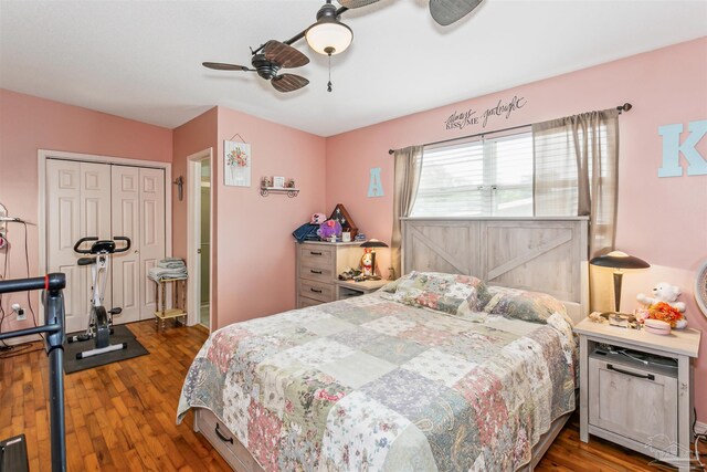 bedroom featuring wood finished floors, ceiling fan, and a closet