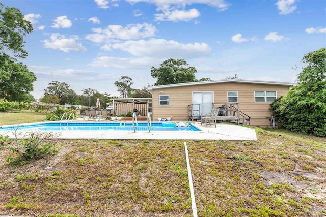 view of pool featuring a fenced in pool and a patio area