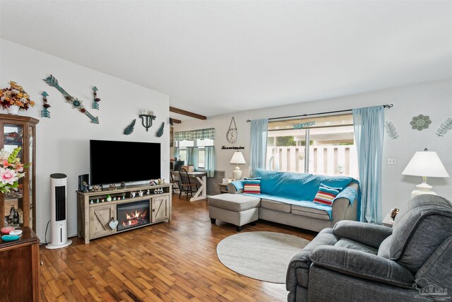 living area with wood finished floors