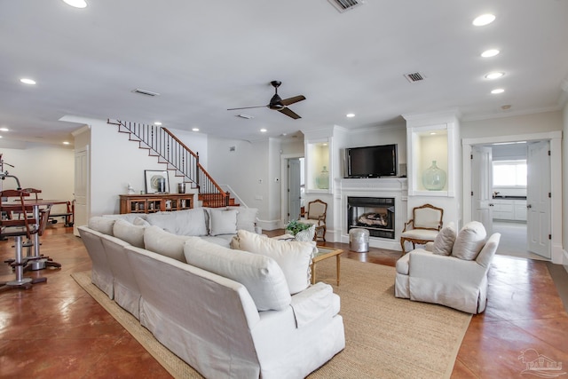 living room featuring recessed lighting, visible vents, ornamental molding, and ceiling fan