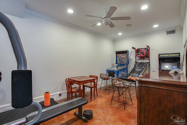 workout room with ornamental molding, ceiling fan, and tile patterned flooring