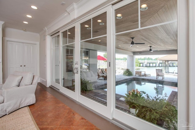 view of swimming pool with french doors and ceiling fan