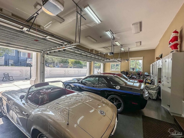 garage featuring a garage door opener