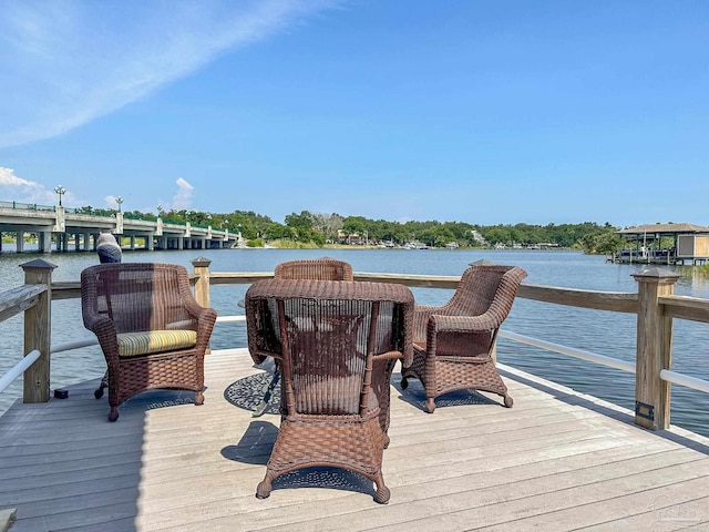 view of dock with a water view