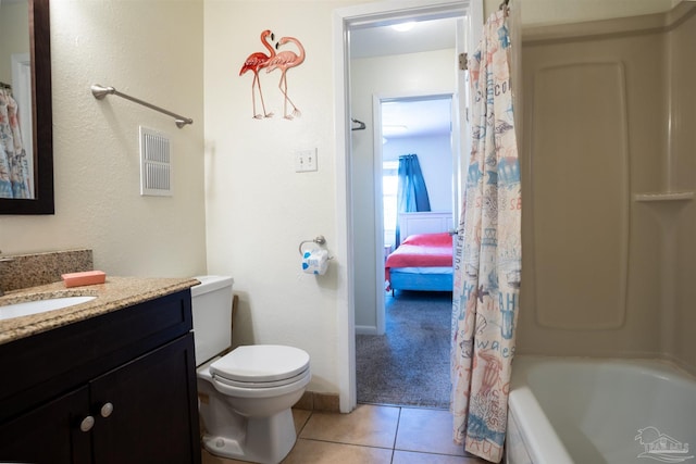 full bathroom featuring vanity, toilet, tile patterned flooring, and shower / bath combo with shower curtain