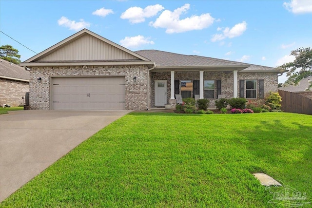 5379 Longhorn Trl, Gulf Breeze, FL 32563 - view of front of property with concrete driveway, an attached garage, and brick siding