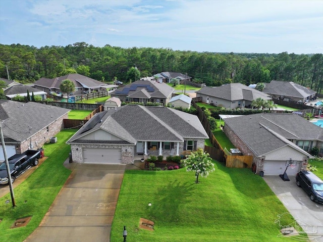 5379 Longhorn Trl, Gulf Breeze, FL 32563 - aerial perspective of suburban area with a forest