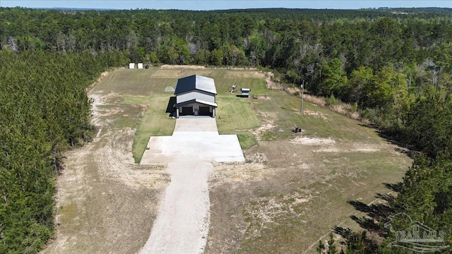 drone / aerial view with a forest view