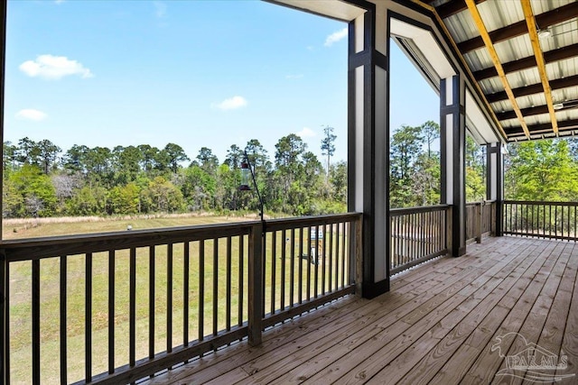 deck featuring a yard