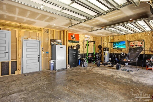 garage with wood walls