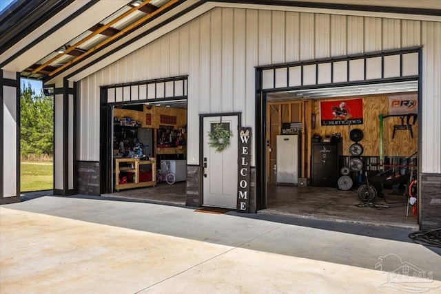 garage with concrete driveway